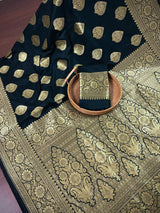 Black with Yellow Gold Banarasi saree in banarasi soft silk with yellow gold muted zari with floral buttas — Kaash Collection