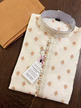 Cream men's kurta pajama in soft raw silk with self-design with antique zari buttis — Kaash Collection
