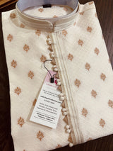 Cream men's kurta pajama in soft raw silk with self-design with antique zari buttis — Kaash Collection