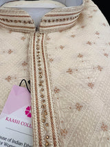 Cream men's kurta pajama in soft raw silk with antique gold zari with hand-stitched neckline — Kaash Collection