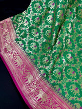 Green & Pink Banarasi saree in banarasi silk with shikargah with elephant & horse motifs — Kaash Collection