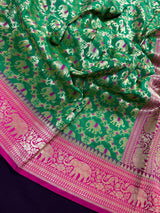 Green & Pink Banarasi saree in banarasi silk with shikargah with elephant & horse motifs — Kaash Collection