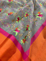 Handmade Grey Banarasi Organza Kora Silk Saree with Orange and Pink Raw Silk Patta on the Border - Floral Embroidery Saree - Kaash