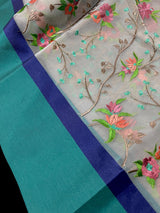 Grey Kora Organza with Blue & Green Patta saree in banarasi kora organza silk with raw silk patta with floral jaal embroidery — Kaash Collection
