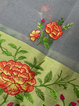 Handmade Light Grey Color Banarasi Kora Organza Saree with Floral Embroidery - Pista Green Raw Silk Border with Floral Embroidery - Kaash