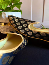 Black handmade men's jutti / mojari wedding shoes in soft banarasi silk with banarasi silk with gold buttis — Kaash Collection