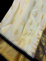 Pastel Cream Color Banarasi Silk Saree with Ganga Yamuna Border in Blue and Pink with Muted Zari Weave and Temple Border