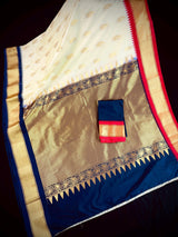 Pastel Cream Color Banarasi Silk Saree with Ganga Yamuna Border in Blue and Pink with Muted Zari Weave and Temple Border