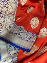 Statement Handmade Burnt Orange Color Banarasi Soft Katan Silk Saree with Floral Buttas with Mehandi Green and Blue Border and Pallu