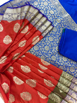 Statement Handmade Burnt Orange Color Banarasi Soft Katan Silk Saree with Floral Buttas with Mehandi Green and Blue Border and Pallu