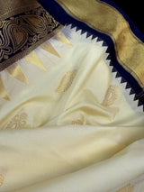 Pastel Cream Color Banarasi Silk Saree with Ganga Yamuna Border in Blue and Pink with Muted Zari Weave and Temple Border