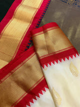 Pastel Cream Color Banarasi Silk Saree with Ganga Yamuna Border in Blue and Pink with Muted Zari Weave and Temple Border