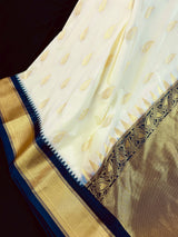 Pastel Cream Color Banarasi Silk Saree with Ganga Yamuna Border in Blue and Pink with Muted Zari Weave and Temple Border