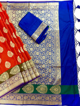 Statement Handmade Burnt Orange Color Banarasi Soft Katan Silk Saree with Floral Buttas with Mehandi Green and Blue Border and Pallu