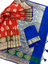 Statement Handmade Burnt Orange Color Banarasi Soft Katan Silk Saree with Floral Buttas with Mehandi Green and Blue Border and Pallu