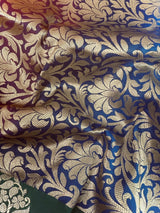 Statement Handmade Burnt Orange Color Banarasi Soft Katan Silk Saree with Floral Buttas with Mehandi Green and Blue Border and Pallu