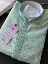 Pastel Green Soft Silk Men Kurta Pajama with Self Design material - Kaash
