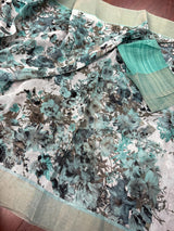Pastel Sea Blue Floral Linen Cotton saree in linen blend cotton silk with floral print with subtle tissue border — Kaash Collection