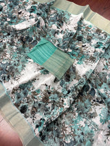 Pastel Sea Blue Floral Linen Cotton saree in linen blend cotton silk with floral print with subtle tissue border — Kaash Collection