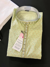 Pista Green men's kurta pajama in soft silk with gold & green patterns with handwork neckline — Kaash Collection