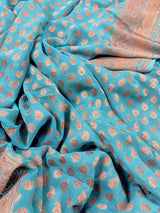 Pastel Blue pure khaddi georgette banarasi silk saree with copper zari with wide border — Kaash Collection