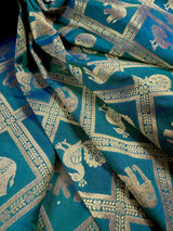 Pure Teal Color Color Saree in Dual Shade | Muted Gold Zari Weaving | Elephant and Peacock Motifs Saree - Kaash