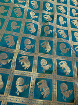 Pure Teal Color Color Saree in Dual Shade | Muted Gold Zari Weaving | Elephant and Peacock Motifs Saree - Kaash