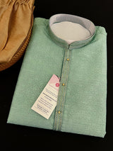 Sea Green men's kurta pajama in raw silk (non-pure) with self-weave with embroidery lace on neckline — Kaash Collection