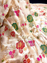 Creamy White with Tint of Gold Banarasi saree in pure banarasi satin with handwoven tanchoi with multi-color floral meenakari jaal — Kaash Collection
