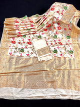 Creamy White with Tint of Gold Banarasi saree in pure banarasi satin with handwoven tanchoi with multi-color floral meenakari jaal — Kaash Collection