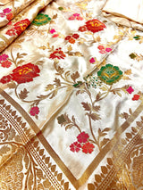 Creamy White with Tint of Gold Banarasi saree in pure banarasi satin with handwoven tanchoi with multi-color floral meenakari jaal — Kaash Collection