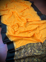 Yellow Banarasi Soft with Black Border saree in banarasi soft silk with buttis with plain black border & ambi pallu — Kaash Collection