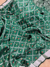 Bottle Green Linen Banarasi Patola saree in linen banarasi with patola design with silver zari weaving — Kaash Collection