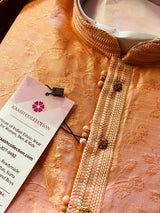Peach men's kurta pajama in raw silk with floral self-embroidery on front, back & sleeves — Kaash Collection
