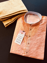 Peach men's kurta pajama in raw silk with floral self-embroidery on front, back & sleeves — Kaash Collection