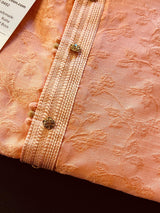 Peach men's kurta pajama in raw silk with floral self-embroidery on front, back & sleeves — Kaash Collection