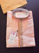 Pink men's kurta pajama in soft silk with small embroidery buttis with neckline detail — Kaash Collection