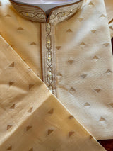 Cream men's kurta pajama in raw silk with hand embroidery & mirror work on neckline — Kaash Collection