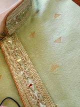 Pista Green men's kurta pajama in soft raw silk with hand embroidery & mirror work on neckline — Kaash Collection