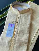 Yellow men's kurta pajama in soft silk with small zari buttis on soft silk — Kaash Collection