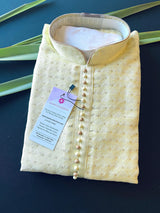 Yellow men's kurta pajama in soft silk with small zari buttis on soft silk — Kaash Collection