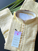 Yellow men's kurta pajama in soft silk with small zari buttis on soft silk — Kaash Collection