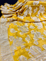 Yellow pure khaddi georgette banarasi silk saree with muted gold zari weave — Kaash Collection