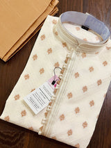 Cream men's kurta pajama in soft raw silk with self-design with antique zari buttis — Kaash Collection