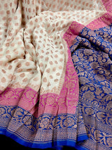 Creamy Beige with Pink and Royal Blue pure khaddi georgette silk saree with copper zari with pink & royal blue borders — Kaash Collection