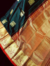 Dark Green with Maroon pure kanjivaram silk saree with gold zari with peacock motifs — Kaash Collection