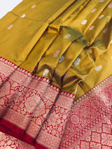 Fenugreek Color Pure Katan Silk Saree with Red Color Border and Pallu - Kaash
