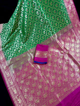 Green & Pink Banarasi saree in banarasi silk with shikargah with elephant & horse motifs — Kaash Collection