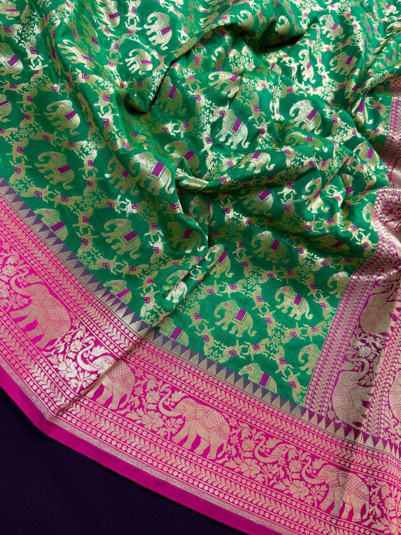 Green & Pink Banarasi saree in banarasi silk with shikargah with elephant & horse motifs — Kaash Collection