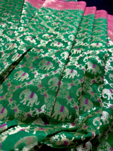Green & Pink Banarasi saree in banarasi silk with shikargah with elephant & horse motifs — Kaash Collection